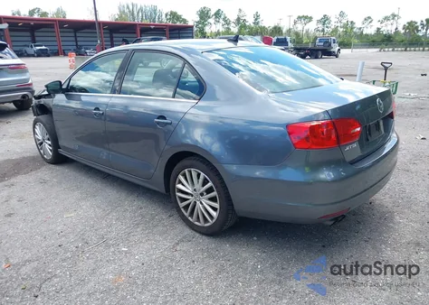2014 Volkswagen Jetta 1.8T Sel z USA, uszkodzony, nr VIN 3VWL07AJ7EM291823